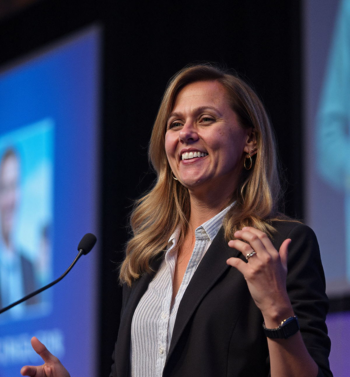 Amanda Evans speaking on stage